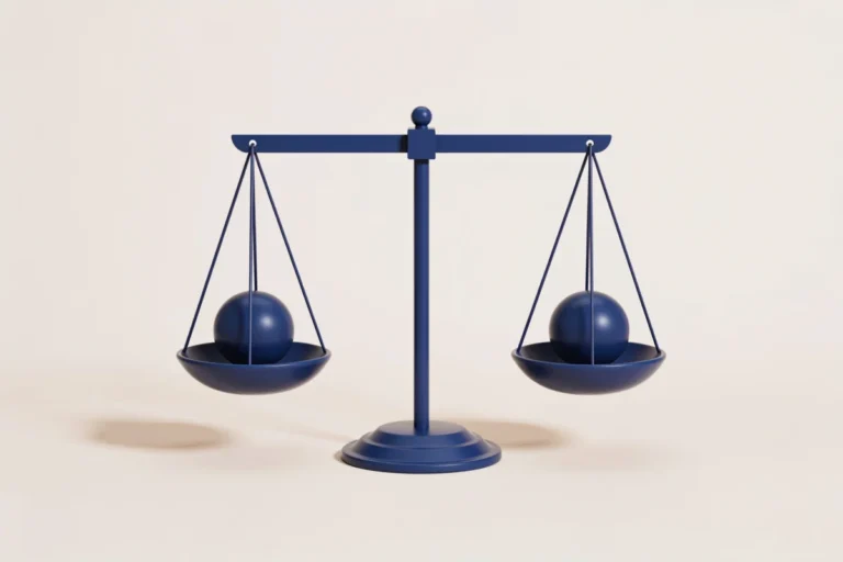 A balanced navy scale weighing two similar spheres, representing index funds versus ETFs